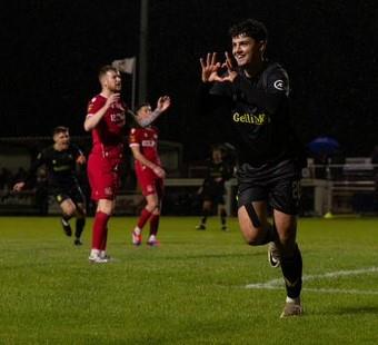 Striker Owain Jones celebrates scoring an early opener for The Bluebirds